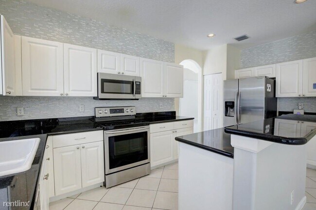 Building Photo - 4 br, 2.5 bath House - 7715 Colony Lake Dr