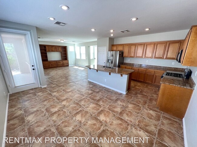 Building Photo - 3 br, 2.5 bath House - 604 BACHELOR BUTTON...