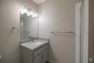 3BR, 2BA - 1,112 SF - Bathroom - The Mews at Dixon Farm