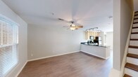 Step into a world of endless possibilities in this beautifully crafted townhome. The heart of this home is the stunning open-concept kitchen and living area, where natural light dances across gleaming hardwood floors. The chef-inspired kitchen boasts sleek stainless-steel appliances, warm wooden cabinetry, and an inviting breakfast bar – perfect for casual dining or entertaining friends.

Ascend the stylish staircase to discover your personal retreat – a spacious 140 sq ft primary bedroom that promises tranquility and comfort. Plush carpeting underfoot adds a touch of luxury, while large windows frame picturesque views of the surrounding greenery.

Two impeccably designed bathrooms offer spa-like experiences, featuring modern fixtures and soothing neutral tones. The main bathroom showcases a generous bathtub, ideal for unwinding after a long day.

Throughout the home, strategically placed track lighting and ceiling fans add both style and function. The in-unit laundry ensures convenience is always at your fingertips.

This Richmond address puts you at the center of it all, allowing you to live, work, and play with ease. Whether you're a first-time homebuyer or looking to downsize without compromising on quality, this townhome offers the perfect canvas to paint your dreams. Welcome home to 9712 Tartuffe Drive – where your aspirations become reality.