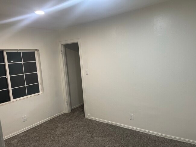 Second bedroom with walk in closet - 2433 Beaumont St