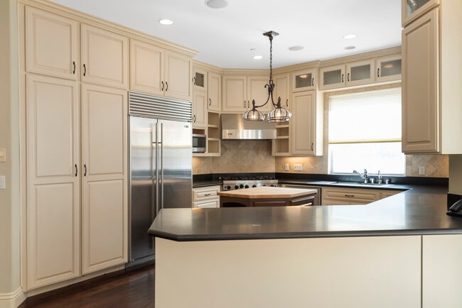 Kitchen with Stainless-Steel Appliances - 620 13th St