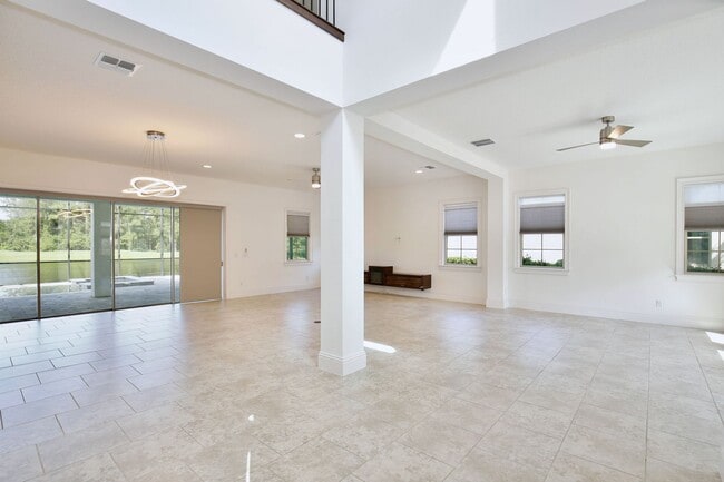 Photo - Stunning 4/5 Executive Pool Home in the Guard-Gated Golf Course Community of Eagle Creek - Orlando!