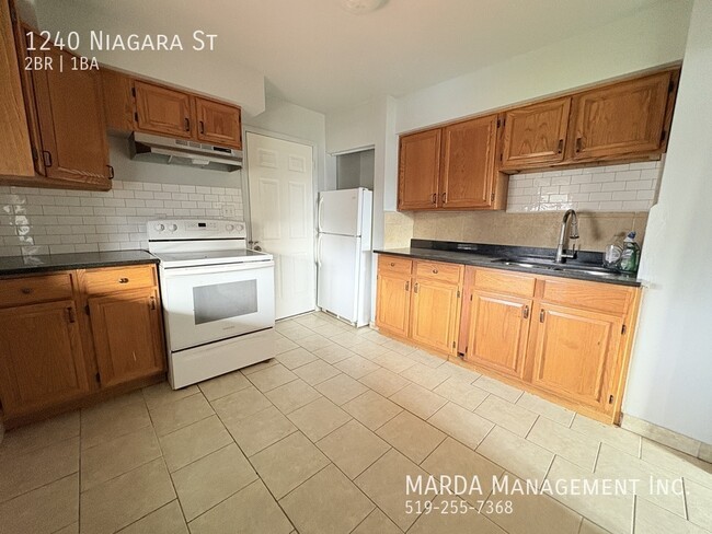 Building Photo - BRIGHT AND COZY 2BEDROOM/1BATH UPPER UNIT ...