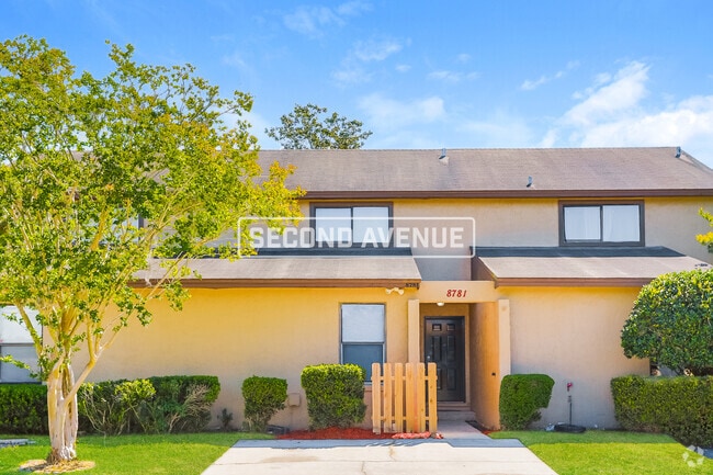 Building Photo - 8781 Whispering Pines Dr