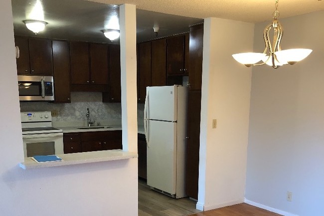 Kitchen with new microwave - 2111 Latham St