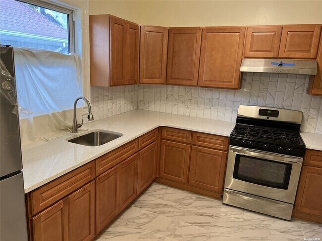 Foto del edificio - 957 E 39th St