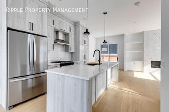 Building Photo - 2144-2151 51 Ave SW