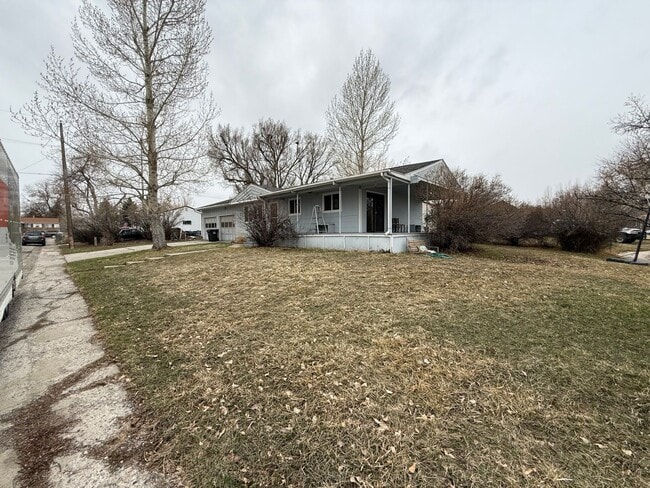 Building Photo - 4 Bedroom 2 Bathroom Home on Large Corner Lot with 2 Car Attached Garage In Great Neighborhood In...