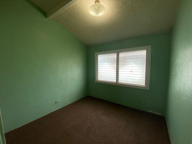 Foto del edificio - Four Bedroom Home