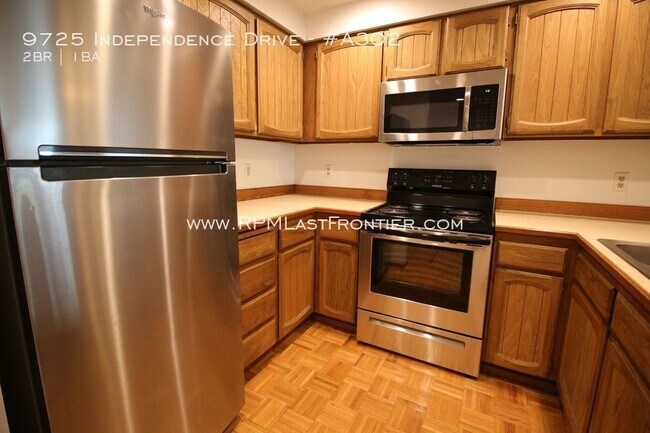 Building Photo - Top floor condo in South Anchorage!