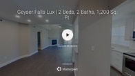 This contemporary 980 square foot apartment offers a blend of style and functionality. The open-concept living area is the heart of the home, featuring vaulted ceilings that create a sense of spaciousness and airiness. A sleek fireplace serves as a focal point, while large windows and sliding glass doors flood the space with natural light and provide access to an outdoor area.

The updated kitchen boasts white cabinetry, stainless steel appliances, and a convenient layout with ample counter space. The apartment's two bedrooms are generously sized, with the primary bedroom measuring 190 square feet. All three bathrooms are modern and well-appointed, featuring clean lines and neutral color schemes.

Throughout the apartment, you'll find a cohesive design aesthetic with neutral wall colors, white trim, and a mix of carpet and wood-look flooring. The property's thoughtful layout maximizes the use of space, with closets for storage and a harmonious flow between rooms. Ceiling fans and recessed lighting add both functionality and style to this inviting living space.