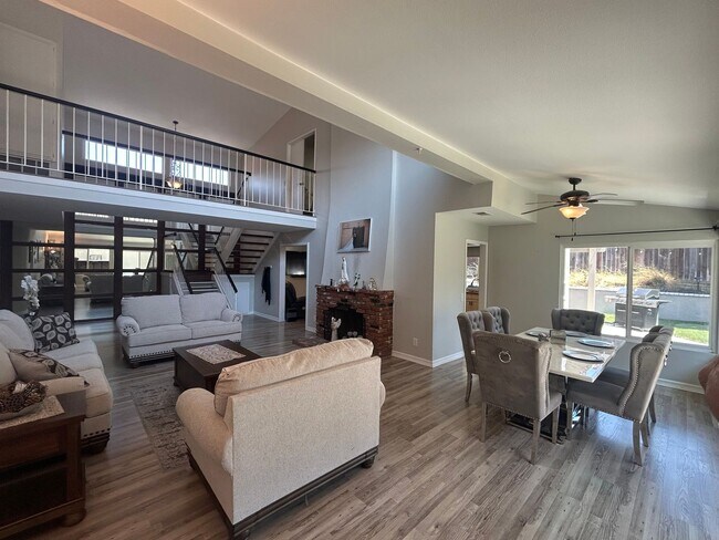 Building Photo - Upgraded 4-Bedroom Home in Gated Green Riv...