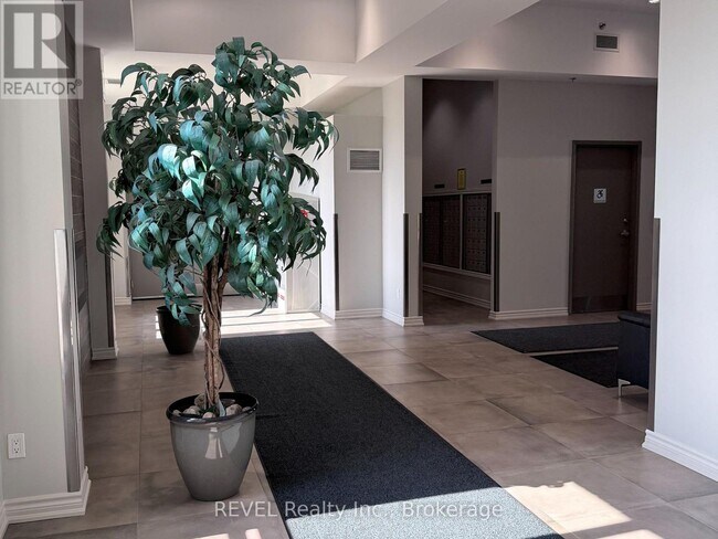 Photo du bâtiment - 1370 Costigan Rd