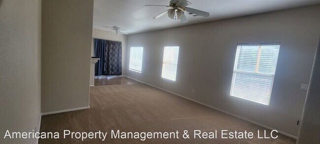 Building Photo - 2 br, 2.5 bath House - 6470 Saddle Up Ave ...