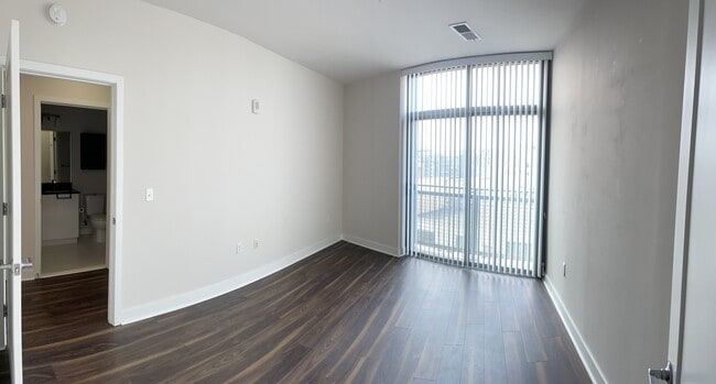 Spacious bedroom with balcony - 460 New York Ave NW