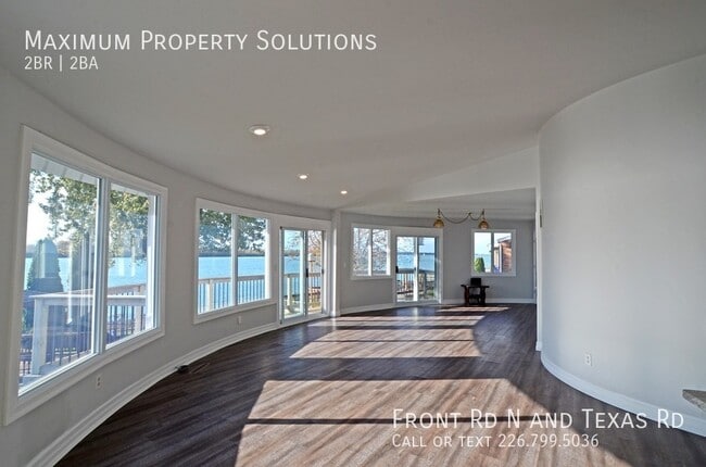 Building Photo - ALL INCLUSIVE! Stunning Waterfront Home