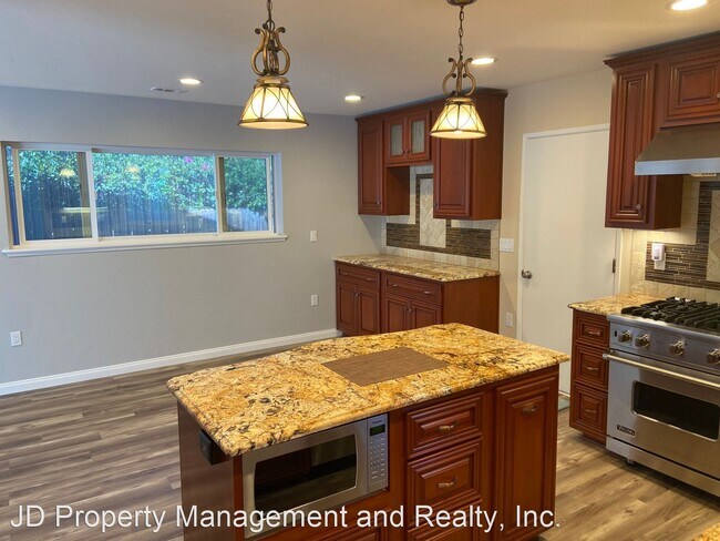 Foto del edificio - 4 br, 2 bath House - 8671 Chantilly Ave