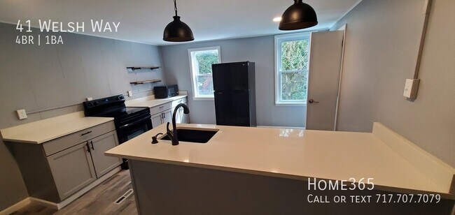 Building Photo - MOVE IN SPECIAL -NEWLY RENOVATED 4 BEDROOM...
