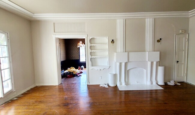Living room with built-ins and mock fireplace - 1007 S Holt Ave