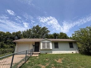 Building Photo - 335 W 61st Pl N