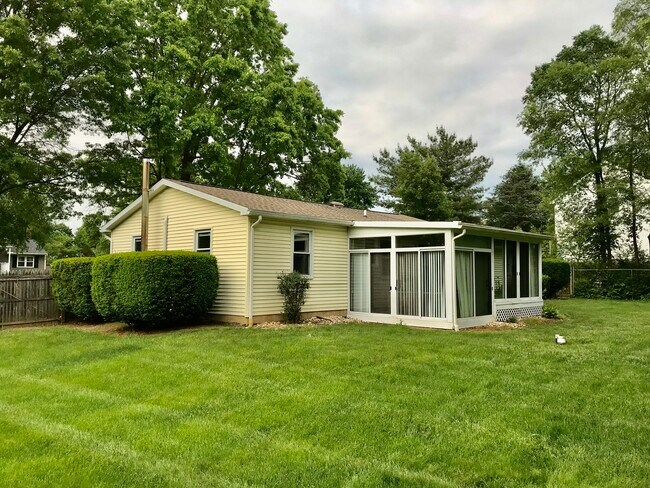 Backyard View of Home w/ Sunroom - 11 Parkside Dr
