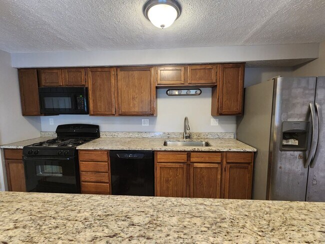 Foto del edificio - Charming 2-Bedroom, 1-Bath Apartment in Si...