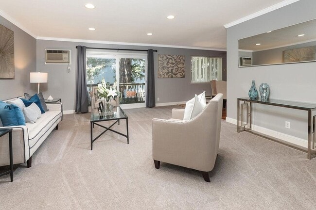Building Photo - Large Condo with A/C, Balcony, 1 Car Garag...