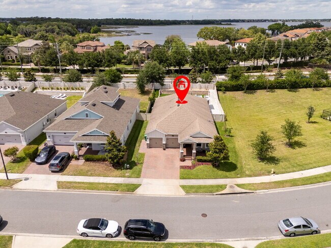 Foto del edificio - "Spacious 4-Bedroom Retreat with 3 Full Baths in Winter Garden's Serene Sanctuary"