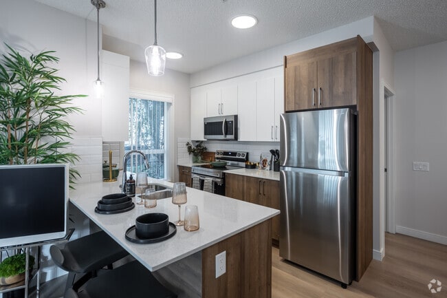 2BR, 2BA - 877SF - Kitchen - Abbey Park Residences