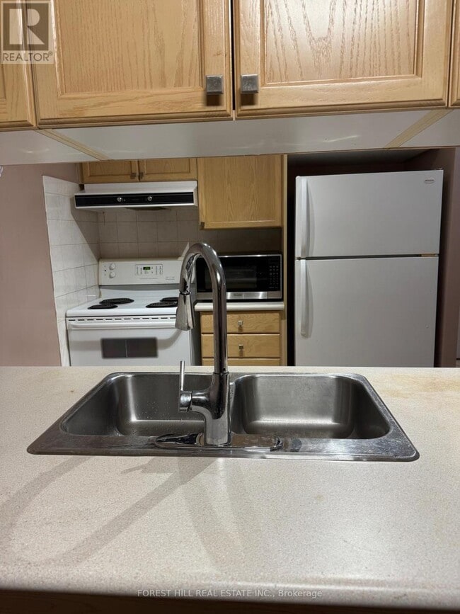 Photo du bâtiment - 909 Bay St.