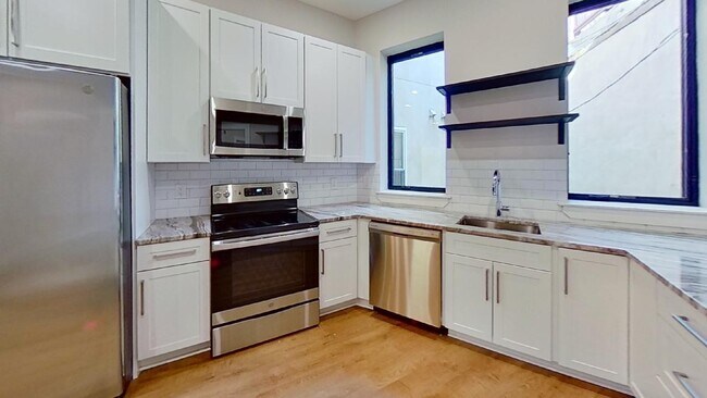 Building Photo - 3859 Lancaster Ave