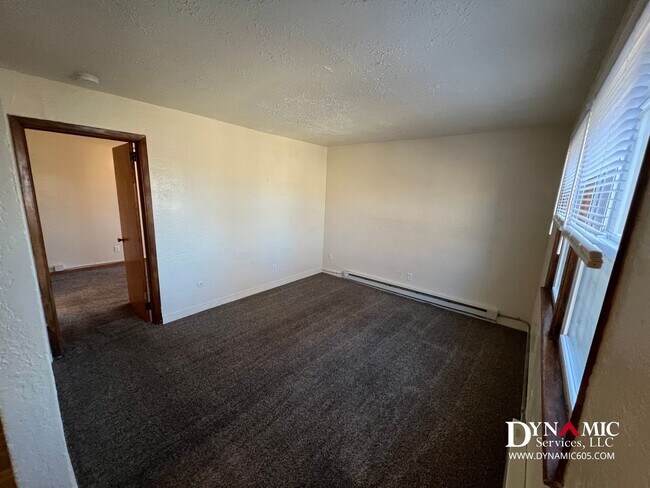 Building Photo - Upper Level 1 Bedroom, 1 Bathroom Apartment - Tenant Pays Electric Only