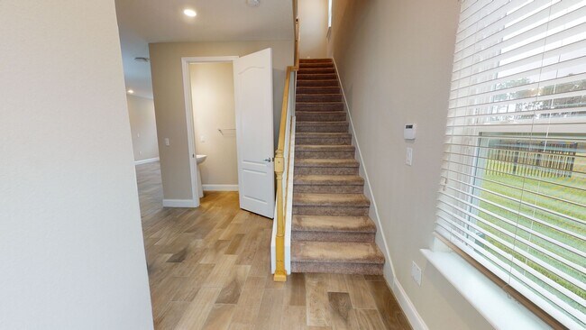 Building Photo - Feel right at home in this spacious, fully...