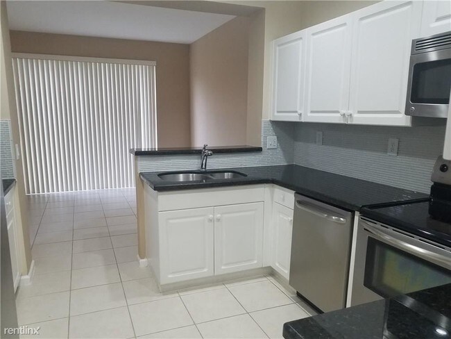 Building Photo - 3 br, 2.5 bath House - 12687 NW 56th Dr