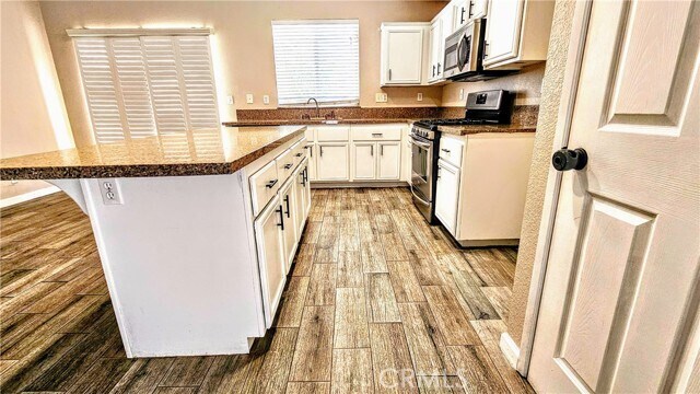 Building Photo - 8819 Dahlia Dr