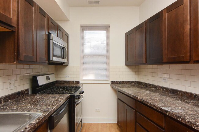 Foto del edificio - 1003 W Sunnyside Ave