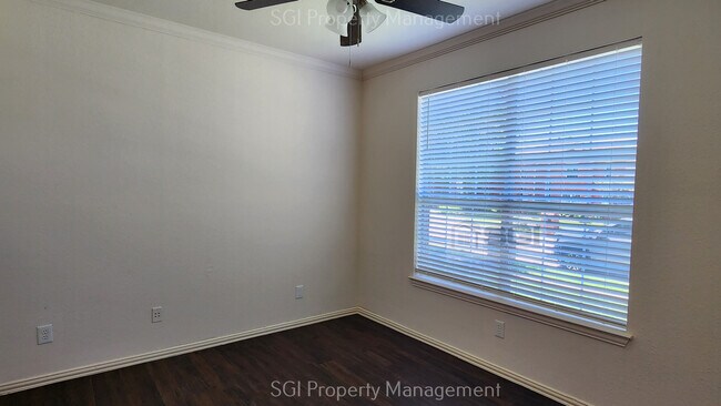 Building Photo - Corner lot with massive yard!