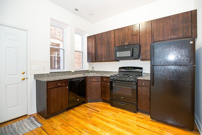 Building Photo - 1706 W Sunnyside Ave