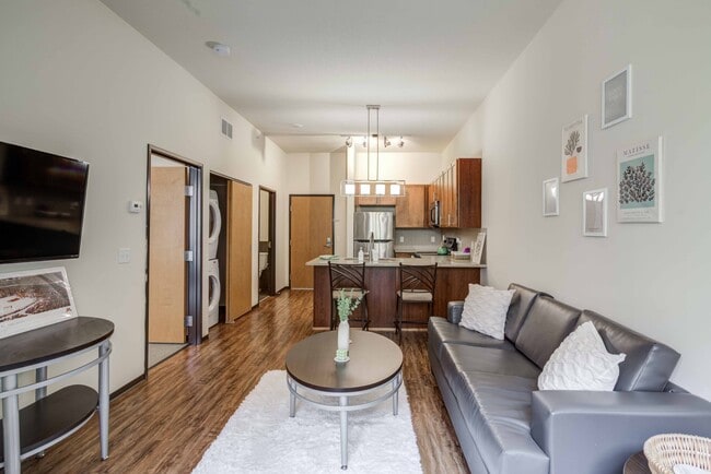 The-Knoll-Dinkytown-Off-Campus-Apartments-Near-The-University-of-Minnesota-Fully-Furnished-Living-Room-to-Kitchen-In-Unit-Washer-and-Dryer - The Knoll Dinkytown