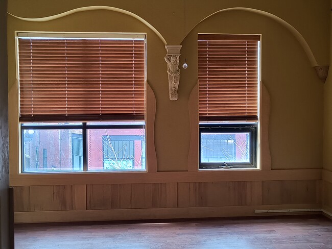 Oversized windows overlooking 5th Avenue in living room. - 109 5th Ave S