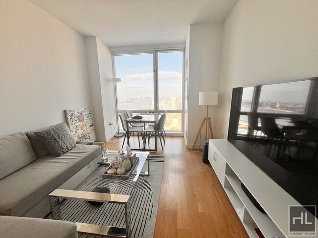 Foto del edificio - Furnished Luxury 1BR! WD in unit! 54th flo...