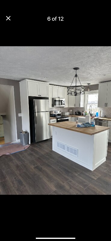 Foto principal - 7411 Pine Island Dr NE