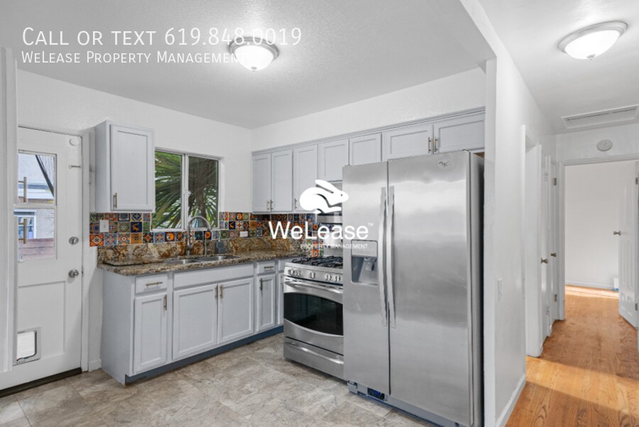 Primary Photo - Charming 3-Bedroom Oasis with Gated Backya...