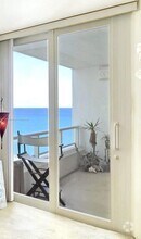 Building Photo - 5005 Collins Ave