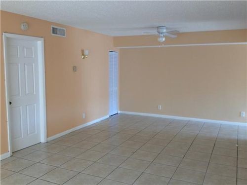 Building Photo - 12256 Royal Palm Blvd