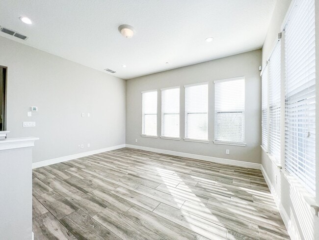 Building Photo - Luxury 4-Bedroom Townhome in Laureate Park – Now Available!