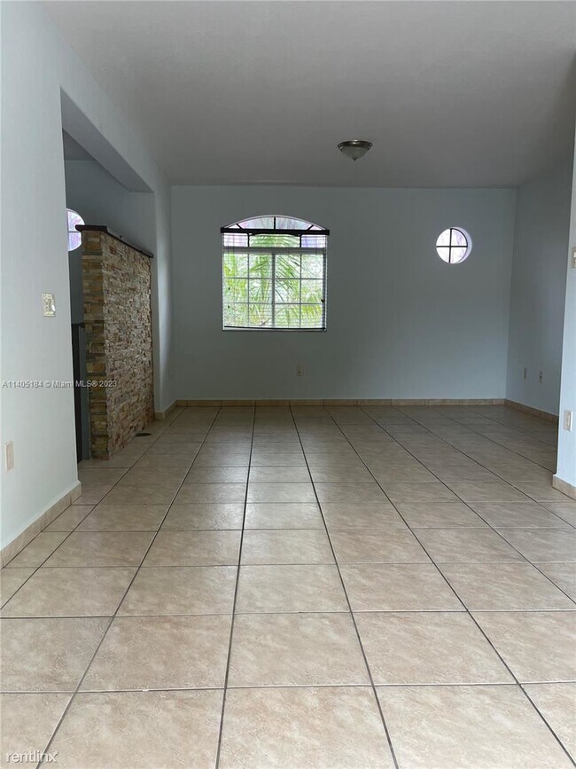 Building Photo - 3 br, 2.5 bath House - 7380 NW 174th Ter A...