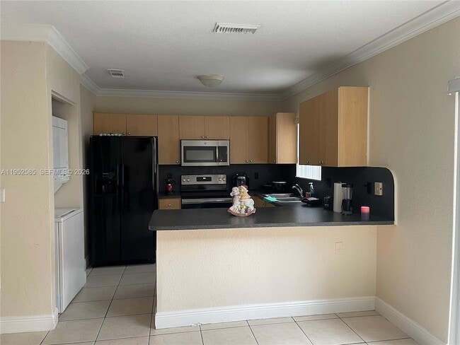 Photo - 8771 NW 106th Ln Townhome