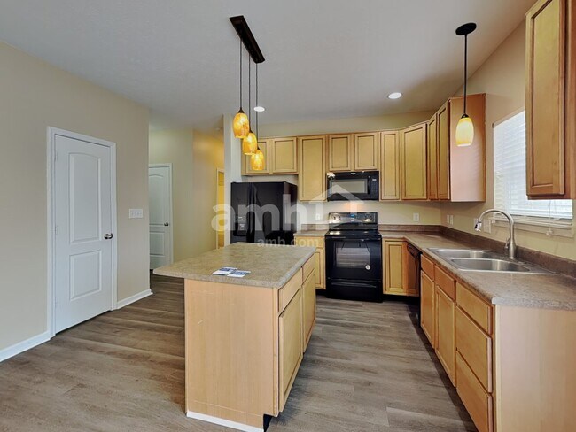 Building Photo - 6694 Wilmot Ln